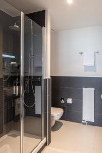 Koupelna v ubytování Hôtel Prealpina