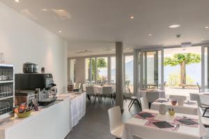 Nápoje v ubytování Hôtel Prealpina