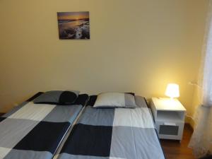Posteľ alebo postele v izbe v ubytovaní Apartement Basti