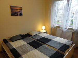 Posteľ alebo postele v izbe v ubytovaní Apartement Basti