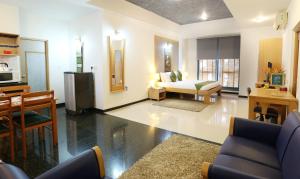 Letto o letti in una camera di Treebo Edha Suites Koramangala