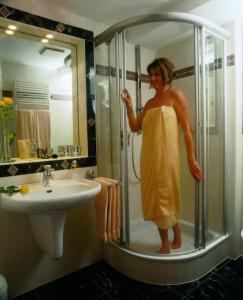 Ein Badezimmer in der Unterkunft Hotel Landhaus Berghof