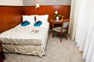 Postel nebo postele na pokoji v ubytování Hotel&Spa Stary Dziwnów basen swimming pool