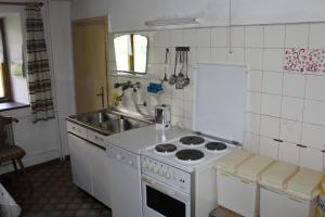 Kuchyň nebo kuchyňský kout v ubytování Rudighof