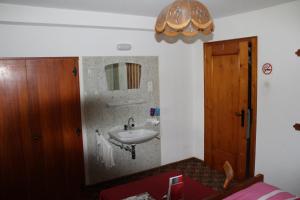 Koupelna v ubytování Rudighof + 6 fotografií
