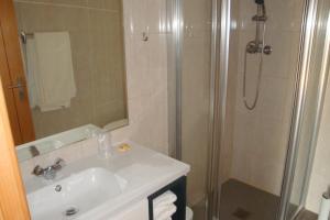 Ванная комната в Guest House Sabores da Beira