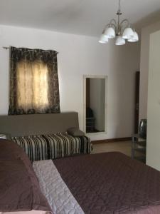Postel nebo postele na pokoji v ubytování SEAVIEW Marsascala Apartment