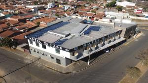 an overhead view of a building with solar panels on it at Hotel Lago Conchal in Conchal