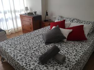 Ein Bett oder Betten in einem Zimmer der Unterkunft La Brisa Malagueta