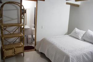 Posteľ alebo postele v izbe v ubytovaní Cemandy Hostal