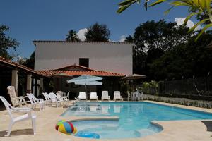 Bazén v ubytování Finca Hotel Guali Santafe nebo v jeho okolí