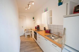 Cuina o zona de cuina de Apartment Hundertwasser