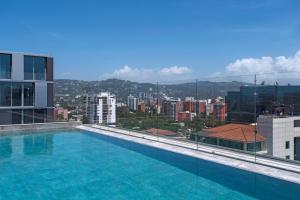 a large swimming pool on the roof of a building at Hyatt Centric Guatemala City in Guatemala
