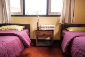 Кровать или кровати в номере Swayambhu View Guest House