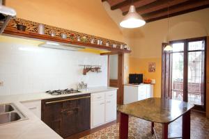 Kjøkken eller kjøkkenkrok på Mas del Molí