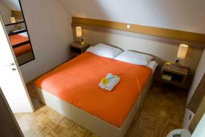 Postel nebo postele na pokoji v ubytování Apartments Čatež - Terme Čatež
