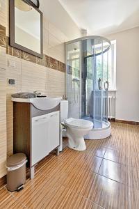 Koupelna v ubytování MoMi Apartament Blonia Szczecin Herbowa + 13 fotografií