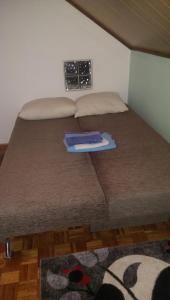 Ένα ή περισσότερα κρεβάτια σε δωμάτιο στο Apartman Ela