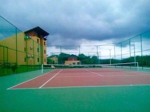 Tennis ja/või seinatennis majutusasutuses Winterville Gravata või selle läheduses