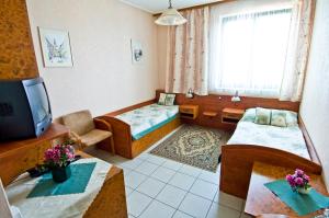 Krevet ili kreveti u jedinici u okviru objekta Hotel Relax u Drsů