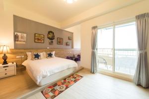 Katil atau katil-katil dalam bilik di Sky Bird Garden B&B