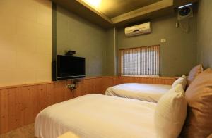TV a/nebo společenská místnost v ubytování Wanli Spa & Resort