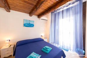 Postel nebo postele na pokoji v ubytování B&B Villa Pia