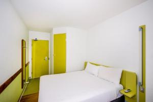 Postel nebo postele na pokoji v ubytování ibis Budget - Newcastle