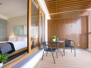 Posteľ alebo postele v izbe v ubytovaní VacationClub - Olympic Park Apartment 404