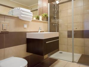Kúpeľňa v ubytovaní VacationClub - Olympic Park Apartment 404