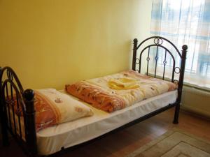Postel nebo postele na pokoji v ubytování Hotel Štadión