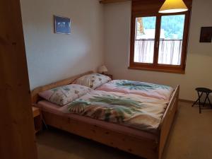 Postel nebo postele na pokoji v ubytování Bärgecho