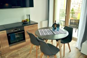 Kuchnia lub aneks kuchenny w obiekcie Windrose Apartment
