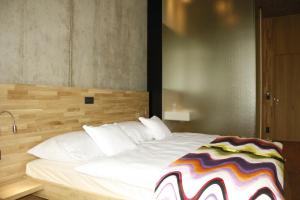 Letto o letti in una camera di Hotel de l'Ecluse Superior