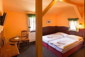 Postel nebo postele na pokoji v ubytování Hotel Diana