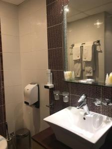 Koupelna v ubytování Hotel Kardinal