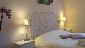 Postel nebo postele na pokoji v ubytování B&B Il Paiolo