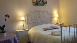 Postel nebo postele na pokoji v ubytování B&B Il Paiolo