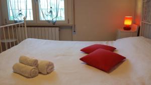Postel nebo postele na pokoji v ubytování B&B Il Paiolo