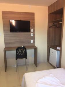 Postel nebo postele na pokoji v ubytování Ilha Bela Hotel