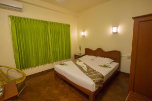 Vuode tai vuoteita majoituspaikassa Inle Apex Hotel