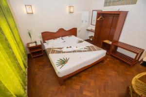 Vuode tai vuoteita majoituspaikassa Inle Apex Hotel
