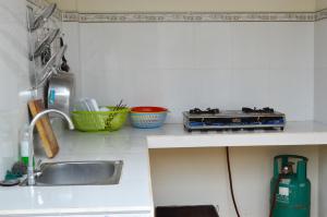 Kuchyň nebo kuchyňský kout v ubytování Ngoc Sang Guesthouse