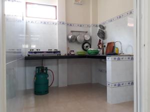 Kuchyň nebo kuchyňský kout v ubytování Ngoc Sang Guesthouse