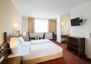 Sjónvarps- og/eða afþreyingartæki á Hahn Hotel Vienna