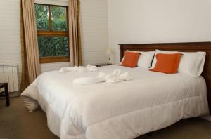 Cama ou camas em um quarto em Lar Aike