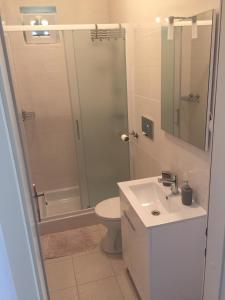 Koupelna v ubytování Apartments Tolic
