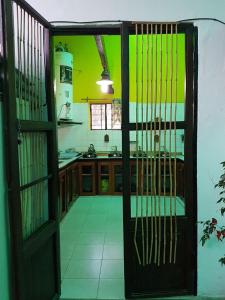 Kuchyň nebo kuchyňský kout v ubytování Hostel La Fortaleza