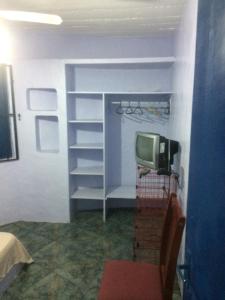 Et tv og/eller underholdning på Casa Canal em Cabo Frio + 6 billeder