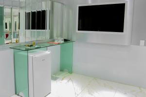 Kuchyň nebo kuchyňský kout v ubytování MOTEL LIBIDUS - Foz do Iguaçu